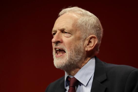 FILE - Jeremy Corbyn, leader of Britain's opposition Labour Party gives an impromptu speech during the Labour Party Conference at the Brighton Centre in Brighton, England, on Sept. 24, 2019. Former U.K. opposition leader Jeremy Corbyn, who led the left-of-center Labour Party while it was stained by allegations of antisemitism, will not be allowed to run for Labour in the next national election, his successor as party leader said Wednesday, Feb. 15, 2023. (AP Photo/Kirsty Wigglesworth, File)