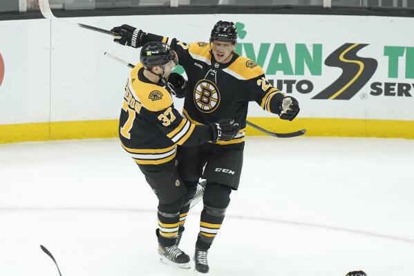 Jeremy Swayman and Linus Ullmark hug following the win over the Sabres, 💛🖤, By NESN