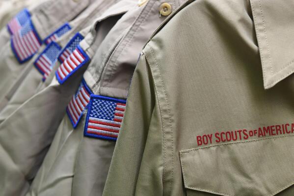 FILE - In this Feb. 18, 2020, file photo, Boy Scouts of America uniforms are displayed in the retail store at the headquarters for the French Creek Council of the Boy Scouts of America in Summit Township, Pa. A bankruptcy judge Thursday, Aug. 19, 2021 approved a proposal by the Boy Scouts of America to enter into an agreement that includes an $850 million fund to compensate tens of thousands of men who say they were sexually abused as youngsters by scout leaders. (Christopher Millette/Erie Times-News via AP, File)