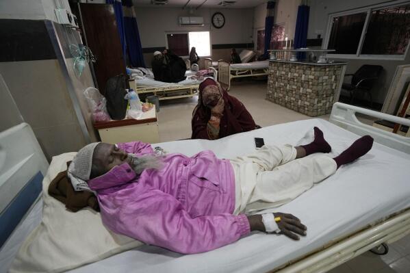 A man rests in the cardiac ward of a hospital in Karachi, Pakistan, Thursday, Jan. 19, 2023. Pakistan has considerable control over infectious diseases but now struggles against cardiovascular diseases, diabetes and cancer as causes of early deaths, according to a new study published Thursday. (AP Photo/Fareed Khan)