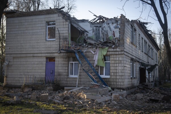 A damaged kindergarten following a Russian drone attack in Kyiv, Ukraine, Saturday, Nov. 25, 2023. Russia launched its most intense drone attack on Ukraine since the beginning of its full-scale invasion on Saturday morning, military officials said. (AP Photo/Efrem Lukatsky)