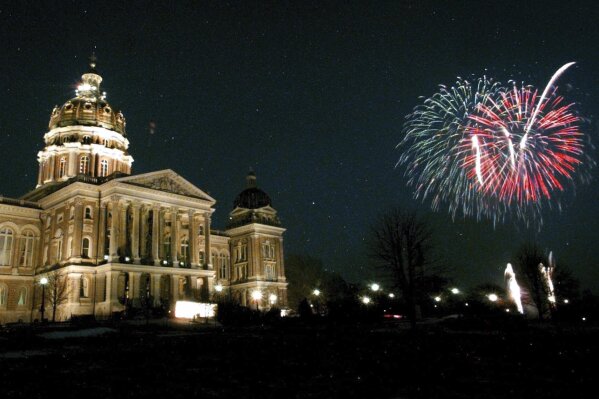 Fireworks fill the sky near the Iowa Statehouse during Iowa Statehood day, Dec. 28, 1996, in Des Moines, Iowa. (AP Photo/Charlie Neibergall, file)