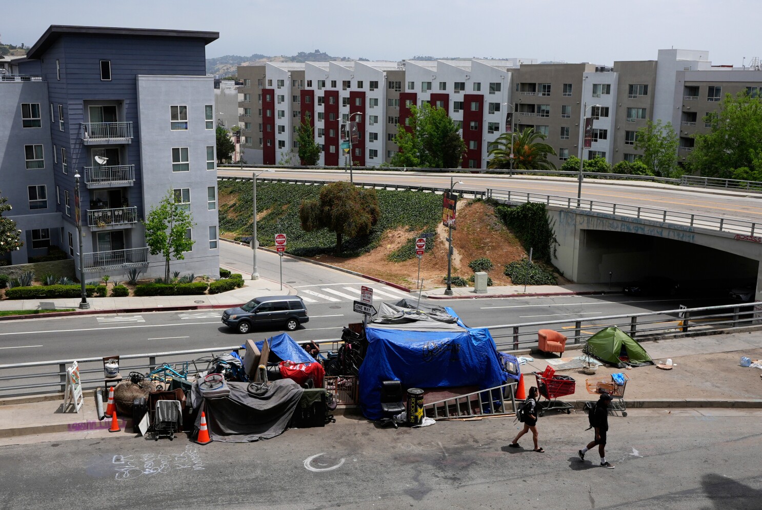 Gov. Newsom urges California cities and counties to ban homeless encampments