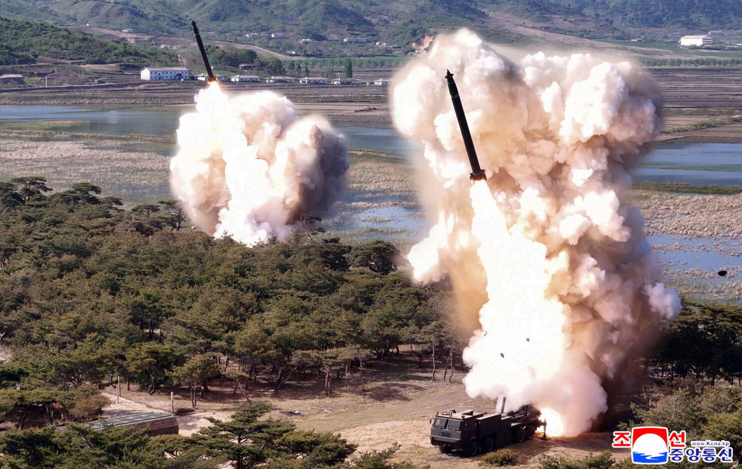 North Korea says leader Kim supervised missile tests simulating nuclear strikes against rivals