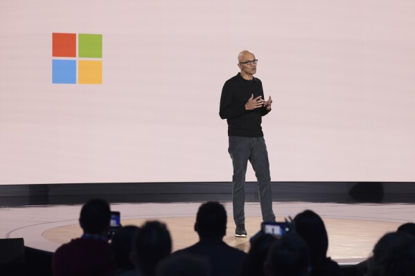 Microsoft Chairman and CEO Satya Nadella speaks during a presentation of the company's AI assistant, Copilot, and 50th Anniversary celebration at Microsoft headquarters, in Redmond, Wash., April 4, 2025. (AP Photo/Jason Redmond, File)