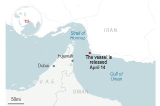 Authorities say armed men boarded a Hong Kong-flagged tanker ship off the coast of Iran near the crucial Strait of Hormuz. They held the ship Tuesday for a short time before releasing it .;