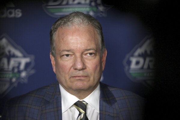 New Jersey Devils general manager Ray Shero speaks to media during the second day of the NHL hockey draft in Vancouver, British Columbia, Saturday, June 22, 2019. (Chad Hipolito/The Canadian Press via AP)