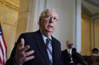 FILE - In this April 20, 2021, file photo, Senate Minority Leader Mitch McConnell, R-Ky., talks after a GOP policy luncheon, on Capitol Hill in Washington. McConnell says Republicans are willing to spend up to $600 billion for roads, bridges and other projects. That's far less than what President Joe Biden is seeking, but is in line with a new $568 billion proposal put forward by other Senate Republicans. (AP Photo/J. Scott Applewhite, File)