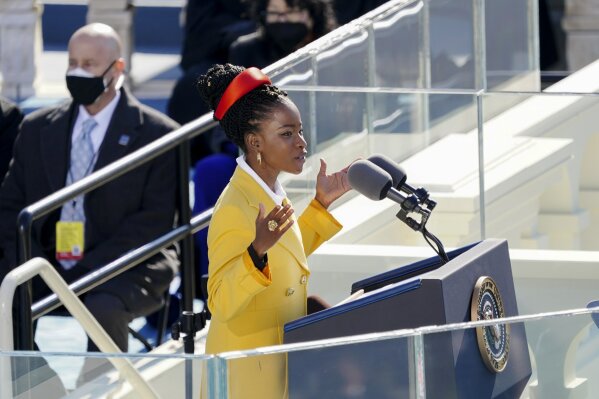 American poet Amanda Gorman reads a poem during the 59th Presidential Inauguration at the U.S. Capitol in Washington, Wednesday, Jan. 20, 2021. (Kevin Dietsch/Pool Photo via AP)