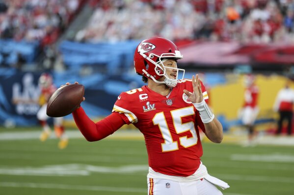 Kansas City Chiefs quarterback Patrick Mahomes (15) throws the ball in warmups prior to the NFL Super Bowl 55 football game against the Tampa Bay Buccaneers, Sunday, Feb. 7, 2021, in Tampa, Fla. (Ben Liebenberg via AP)