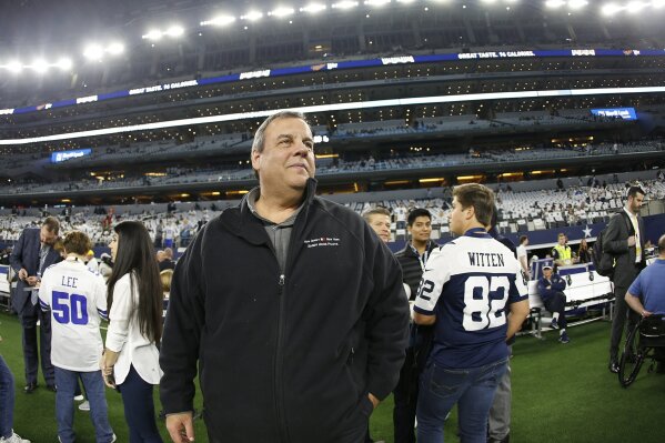 FILE - In this Jan. 5, 2019, file photo, former New Jersey Gov. Chris Christie walks on the field before a NFC wild-card NFL football game between the Dallas Cowboys and the Seattle Seahawks in Arlington, Texas. Christie has joined the board of directors of the New York Mets. Christie was New Jersey's governor from January 2010 to January 2018. His son Andrew has worked for the team since 2018 and is the Mets' coordinator of international scouting. (AP Photo/Ron Jenkins, File)