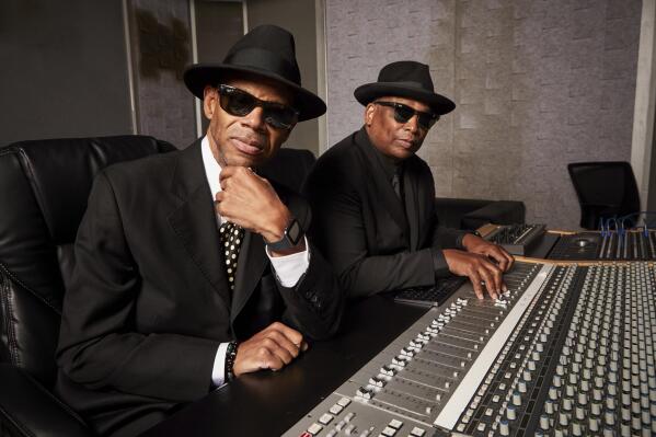 FILE - Jimmy Jam, left, and Terry Lewis pose for a portrait in New York on Monday, July 26, 2021. The duo, who've worked with Prince, Janet Jackson, Mariah Carey, Boyz II Men, will be inducted into the Rock & Roll Hall of Fame.  (Photo by Matt Licari/Invision/AP, File)