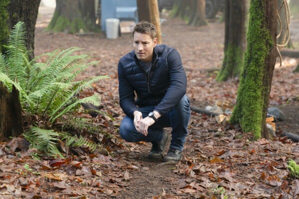 This image released by CBS shows Justin Hartley, as Colter Shaw, in a scene from "Tracker," premiering Feb. 11. (Michael Courtney/CBS via AP)