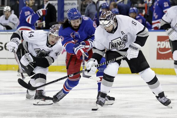 Blake Lizotte of the Los Angeles Kings skates the puck against