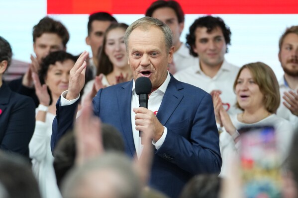 FILE - Donald Tusk, a former Polish prime minister addresses supporters at his party headquarters in Warsaw, Poland, Sunday, Oct. 15, 2023. Poland's voters delivered a clear verdict. After eight years of rule by an illiberal government, they have had enough. While the conservative ruling Law and Justice party won more votes than any other single party, it lost its majority in parliament and will not hold enough seats to govern the country. (AP Photo/Petr David Josek, File)