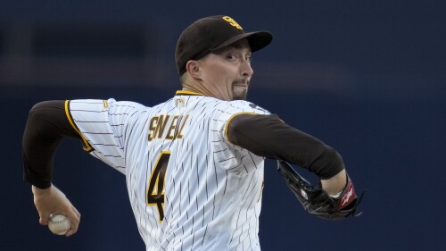San Diego Padres starting pitcher Blake Snell works against a New York Mets batter during the first inning of a baseball game Saturday, July 8, 2023, in San Diego. (AP Photo/Gregory Bull)