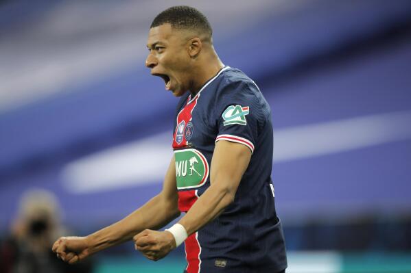 PSG's Kylian Mbappe celebrates after scoring his side's second goal during the French Cup final soccer match between Paris Saint Germain and Monaco at the Stade de France stadium, in Saint Denis, north of Paris, Wednesday, May 19, 2021. (AP Photo/Christophe Ena)
