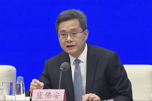 In this image made from a video, China's Finance Minister Lan Fo'an speaks during a new briefing in Beijing Saturday, Oct. 12, 2024. (AP Photo)