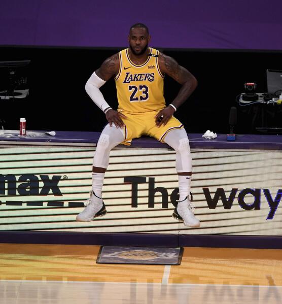 Lakers lose in Atlanta as LeBron gets knee examined in LA