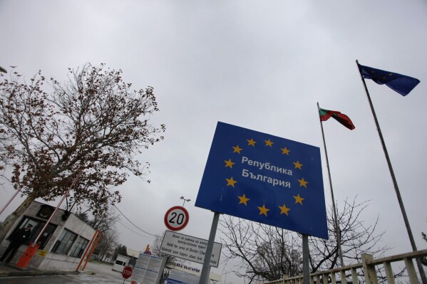 FILE - This photo taken Thursday, Jan. 20, 2011 shows the Kapitan Andreevo border crossing point between Bulgaria and Turkey. Bulgaria and Romania have received permission to join Europe’s passport- and visa-free Schengen Area starting in March, the governments of the two countries said. (AP Photo/Valentina Petrova, File)