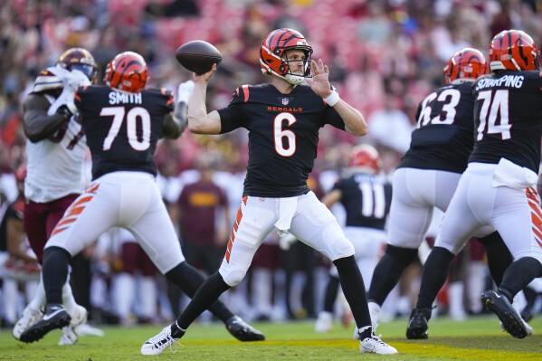 Cincinnati Bengals quarterback Jake Browning (6) throwing a pass during the first half of an NFL preseason football game against the Washington Commanders, Saturday, Aug. 26, 2023, in Landover, Md. (AP Photo/Julio Cortez)