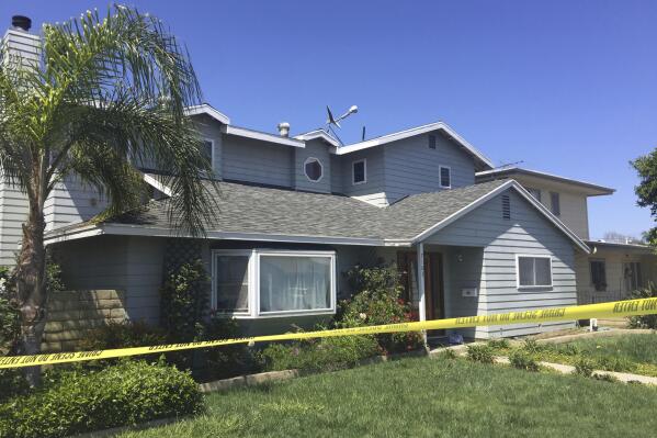 FILE - The home occupied by Stephen Beal in Long Beach, Calif., is pictured on May 16, 2018. A judge has declared a mistrial in a case against a man charged with blowing up his ex-girlfriend's Southern California spa business, killing her and injuring two others with a box rigged with explosives. U.S. District Judge Josephine Staton declared the mistrial on Monday, Aug. 22, 2022, after jurors deadlocked on the case against Beal. (AP Photo/Amanda Lee Myers, File)