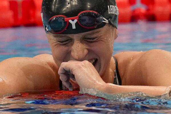 Katie Ledecky, of the United States, reacts after winning the women's 1500-meters freestyle final at the 2020 Summer Olympics, Wednesday, July 28, 2021, in Tokyo, Japan.(AP Photo/Petr David Josek)