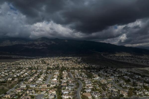 Rain clouds hover over Rancho Cucamonga, Calif., Wednesday, Dec. 7, 2022. Voters in one of Southern California's largest counties have delivered a pointed if largely symbolic message about frustration in the nation's most populous state: Officials will soon begin studying whether to break free from California and form a new state. Voters in one of Southern California's largest counties have delivered a pointed if largely symbolic message about frustration in the nation's most populous state: Officials will soon begin studying whether to break free from California and form a new state. (AP Photo/Jae C. Hong)
