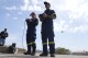 Firefighters fly a drone during the "Through Fire 2025" drill in Lavrio, about 60 kilometres (37 miles) southeast of Athens, Greece, Thursday, May 22, 2025. (AP Photo/Thanassis Stavrakis)
