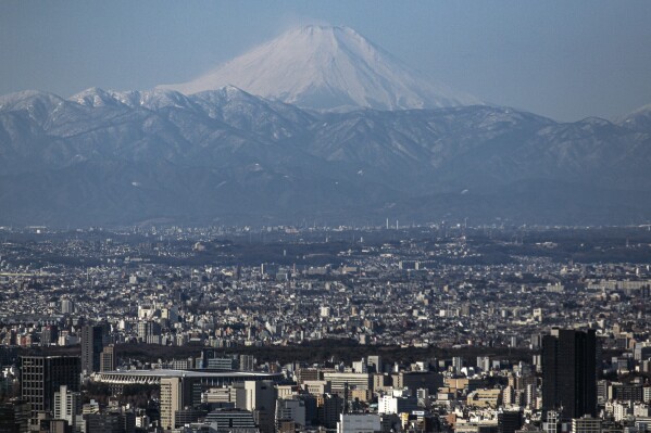 Mount Fuji is viewed, Jan. 29, 2021, in Tokyo. (AP Photo/Kiichiro Sato, file)