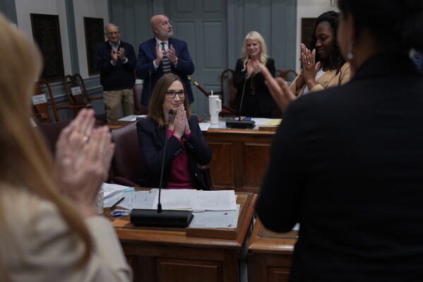 U.S.-Rep.-elect Sarah McBride, D-Del., acknowledges applause after her farewell speech on the Senate floor during a special session, her last day as a Delaware state senator, at the Delaware Legislative Hall in Dover, Del., Monday, Dec. 16, 2024. (AP Photo/Carolyn Kaster)