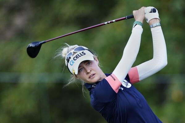 Nelly Korda hits from the tee on the ninth hole during the second round of play in the KPMG Women's PGA Championship golf tournament Friday, June 25, 2021, in Johns Creek, Ga. (AP Photo/John Bazemore)