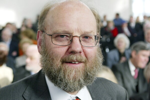 FILE - Scottish scientist Ian Wilmut is seen in the Pauls Church in Frankfurt, central Germany, Monday, March 14, 2005. Ian Wilmut, the cloning pioneer whose research was critical to the creation of Dolly the Sheep, has died, the Roslin Institute at the University of Edinburgh said Monday. He was 79. (AP Photo/Michael Probst, File)