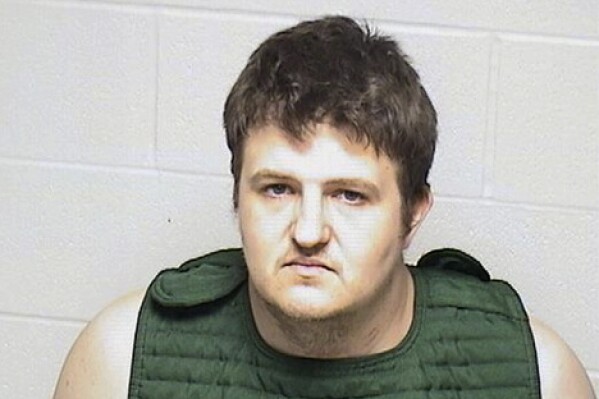 In a photo provided by the Lake County State's Attorney, date not known, is Jason Karels, 36, of Round Lake Beach, Ill. Karels, who told his estranged wife “If I can’t have them neither can you,” pleaded guilty but mentally ill Friday, Dec. 15, 2023, to three counts of first-degree murder for killing their three young children, a prosecutor said. Karels will be sentenced to life in the Illinois Department of Corrections without the possibility of parole, Lake County State’s Attorney Eric Rinehart said. (Lake County State's Attorney via AP)