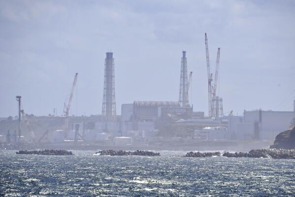 The Fukushima Daiichi nuclear power plant is seen in Namie, Fukushima prefecture, northern Japan, Thursday, Aug. 24, 2023. The operator of the tsunami-wrecked Fukushima Daiichi nuclear power plant says it has begun releasing its first batch of treated radioactive water into the Pacific Ocean — a controversial step, but a milestone for Japan’s battle with the growing radioactive water stockpile.(Kyodo News via AP)