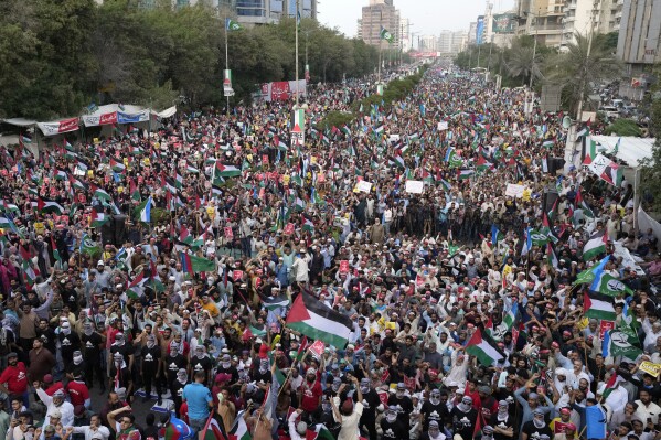 Supporters of the religious and political party Jamaat-e-Islami attend a demonstration against Israeli airstrikes on Gaza, to show solidarity with Palestinian people, in Karachi, Pakistan, Sunday, Oct. 15, 2023. (AP Photo/Fareed Khan)