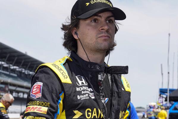 FILE - Colton Herta prepares to drive during practice for the IndyCar auto race at Indianapolis Motor Speedway in Indianapolis, May 20, 2022. Depending on who you ask, Herta is the highest-paid driver on the IndyCar grid. (AP Photo/Michael Conroy, File)