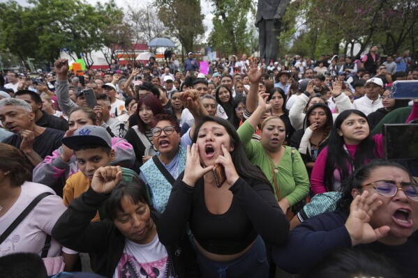 Supporters of Lenia Batres, who is running for election for the Mexican Supreme Court, cheer her on during her closing campaign rally in Mexico City, Wednesday, May 28, 2025. (AP Photo/Fernando Llano)