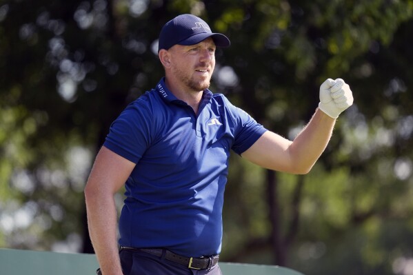 Matt Wallace of England gestures before teeing off on the ninth hole during the first round of the Byron Nelson golf tournament in McKinney, Texas, Thursday, May 2, 2024. (AP Photo/LM Otero)