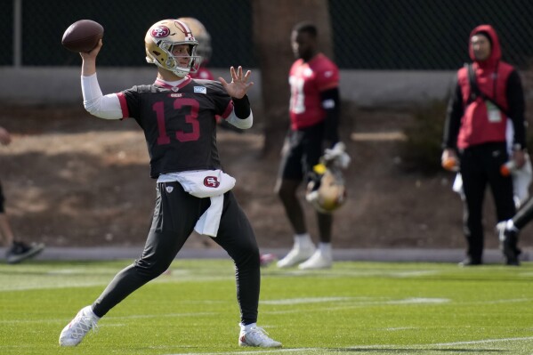 San Francisco 49ers quarterback Brock Purdy (13) throws during practice ahead of the Super Bowl 58 NFL football game Wednesday, Feb. 7, 2024, in Las Vegas. (AP Photo/John Locher)