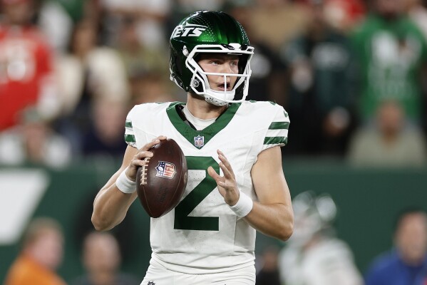 New York Jets quarterback Zach Wilson (2) looks to pass against the Kansas City Chiefs during the first quarter of an NFL football game, Sunday, Oct. 1, 2023, in East Rutherford, N.J. (AP Photo/Adam Hunger)