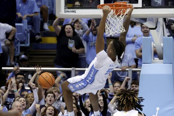 North Carolina forward Armando Bacot dunks during the second half of the team's NCAA college basketball game against Wake Forest on Wednesday, Jan. 4, 2023, in Chapel Hill, N.C. (AP Photo/Chris Seward)