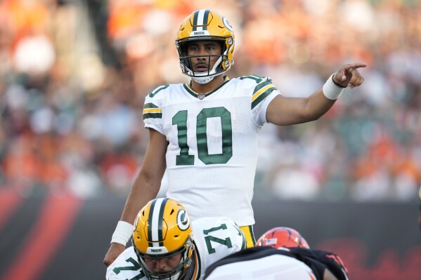 Love, Clifford help Packers roll past Bengals in preseason opener. Burrow  watches from sideline