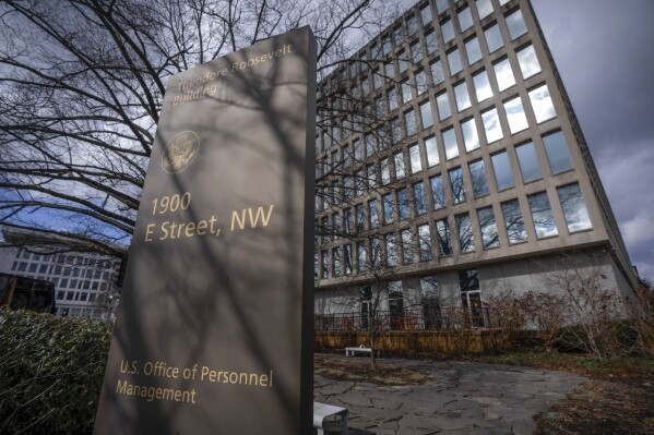 The Theodore Roosevelt Building, location of the U.S. Office of Personnel Management, on Feb. 13, 2024, in Washington. Former President Donald Trump has plans to radically reshape the federal government if he returns to the White House, from promising to deport millions of immigrants in the U.S. illegally to firing tens of thousands of government workers. (AP Photo/Mark Schiefelbein)