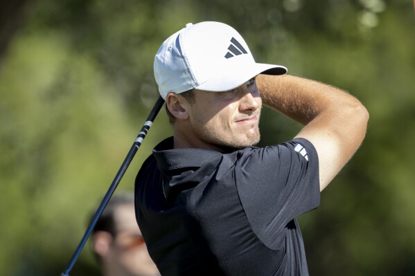 Ludvig Aberg, of Sweden, watches his drive down the ninth fairway during the final round of the RSM Classic golf tournament, Sunday, Nov. 19, 2023, in St. Simons Island, Ga. (AP Photo/Stephen B. Morton)