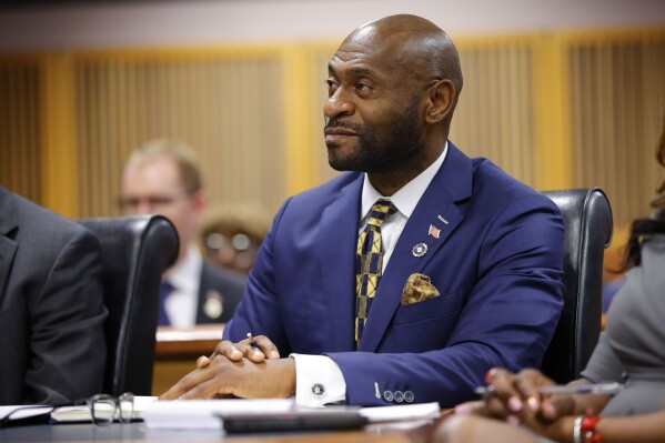 FILE- Special prosecutor Nathan Wade looks on during a hearing on the Georgia election interference case, Friday, March, 1, 2024, in Atlanta. A progressive Democrat and a Republican who briefly worked in Donald Trump's administration entered the Fulton County district attorney's race Friday, March 8, 2024, as the current officeholder, Fani Willis, awaits a judge's decision on whether she will be removed from the Georgia election interference case against the former president because of a relationship with Wade. (AP Photo/Alex Slitz, Pool, File)