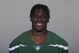 FILE - This is a 2021 file photo of Carl Lawson of the New York Jets NFL football team. Jets star defensive end Carl Lawson was carted off the field Thursday, Aug. 19, 2021, with an apparent leg injury during the team's joint practice with the Green Pay Packers. (AP Photo/File)