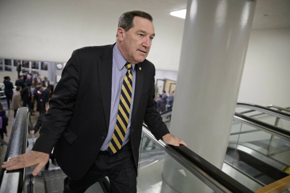 
              FILE - In this April 7, 2017, file photo, U.S. Sen. Joe Donnelly, D-Ind., arrives for the confirmation vote for Supreme Court nominee, Neil Gorsuch, on Capitol Hill in Washington. Donnelly railed against Carrier Corp. for moving manufacturing jobs to Mexico last year, even while he profited from a family business that relies on Mexican labor to produce dye for ink pads, according to records reviewed by The Associated Press. (AP Photo/J. Scott Applewhite, File)
            