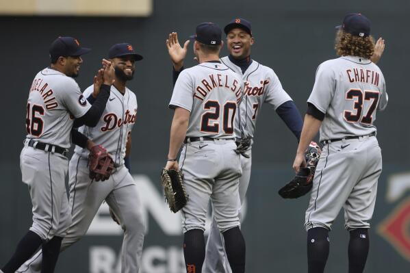 Members of the Detroit Tigers celebrate their 4-2 win over the Minnesota Twins following the 10th inning of a baseball game Wednesday, May 25, 2022, in Minneapolis. (AP Photo/Stacy Bengs)