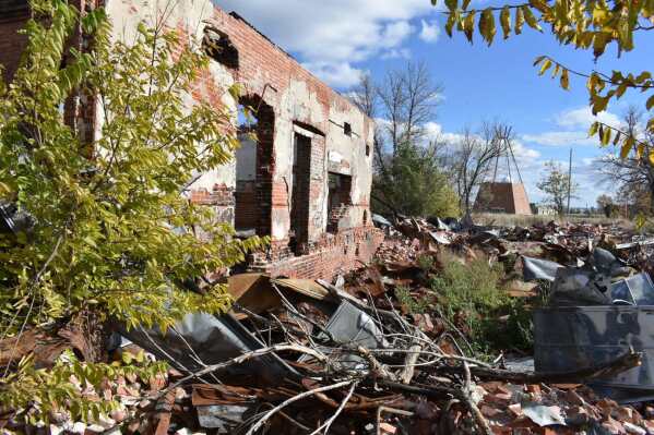 FILE - Ruins of a Native American boarding school on the Rosebud Sioux Reservation are pictured in Mission, S.D., Oct. 15, 2022. U.S. Catholic Bishops are slated to approve a new outreach plan for Native American Catholics during a convention on Friday, June 14, 2024, in Louisville, Ky. The plan is part of an effort to make amends for the widespread abuses inflicted on Native youths at Catholic-run boarding schools in the 19th and 20th centuries. (AP Photo/Matthew Brown, File)